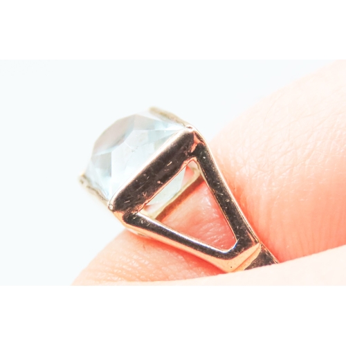 21 - Single Stone Aquamarine Bezel Set Ring Mounted in 9 Carat Rose Gold Ring Size O