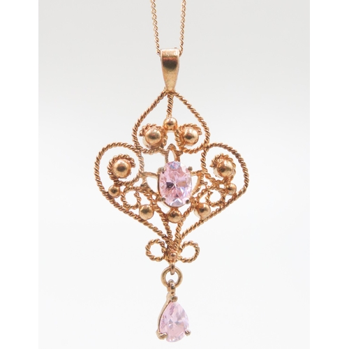 211 - Oval Cut and Pear Cut Pink Zircon Set Filigree Form Pendant Set in 9 Carat Yellow Gold Finely Detail... 