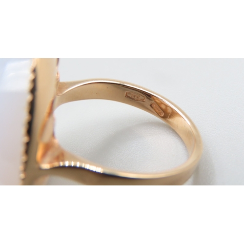 234 - Facet Cut Moonstone Ring with Gemstone Set Halo Mounted in 18 Carat Rose Gold Ring Size L and a Half