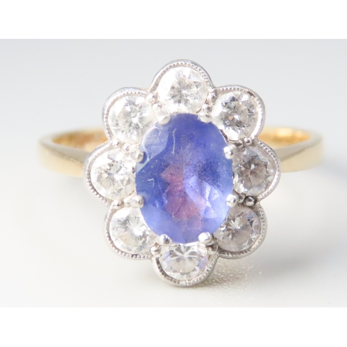 235 - Tanzanite AAA Centre Stone Ring with Eight Diamond Set Hallo Surround Mounted in 18 Carat Yellow Gol... 