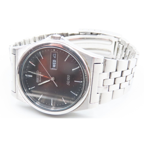 239 - Seiko Quartz Gentleman's Wristwatch SQ100 Day Date Aperture As New with Original Presentation Box