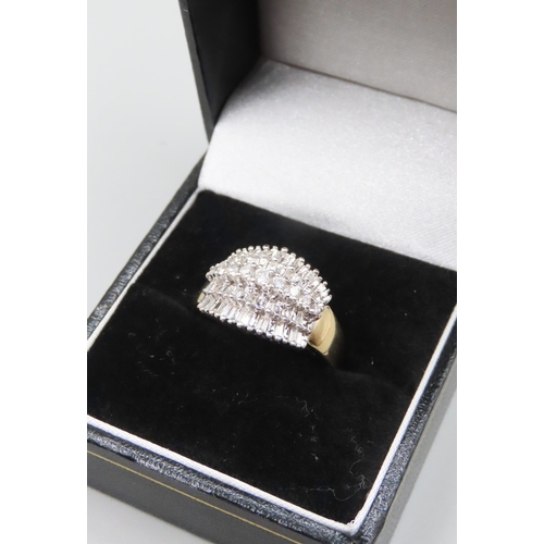 240 - Finely Detailed Tapered Baguette and Round Cut Diamond Cluster Set Five Row Ring Mounted in 18 Carat... 