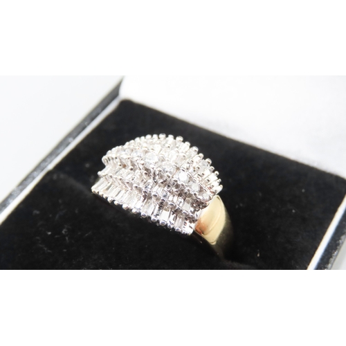 240 - Finely Detailed Tapered Baguette and Round Cut Diamond Cluster Set Five Row Ring Mounted in 18 Carat... 