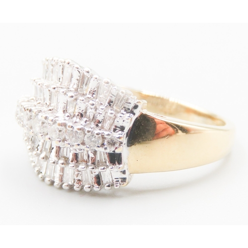 240 - Finely Detailed Tapered Baguette and Round Cut Diamond Cluster Set Five Row Ring Mounted in 18 Carat... 