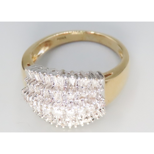 240 - Finely Detailed Tapered Baguette and Round Cut Diamond Cluster Set Five Row Ring Mounted in 18 Carat... 