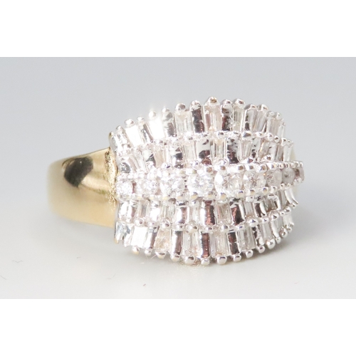 240 - Finely Detailed Tapered Baguette and Round Cut Diamond Cluster Set Five Row Ring Mounted in 18 Carat... 