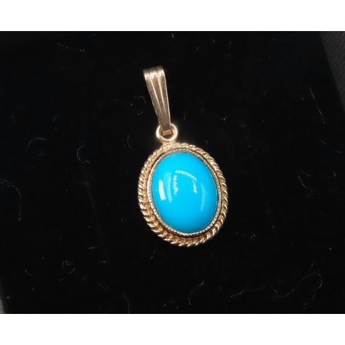 242 - Bezel Set Turquoise Set Single Stone Pendant Mounted in 9 Carat Yellow Gold 1.5cm High