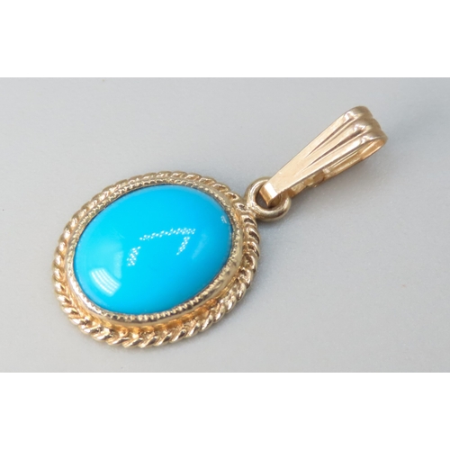 242 - Bezel Set Turquoise Set Single Stone Pendant Mounted in 9 Carat Yellow Gold 1.5cm High