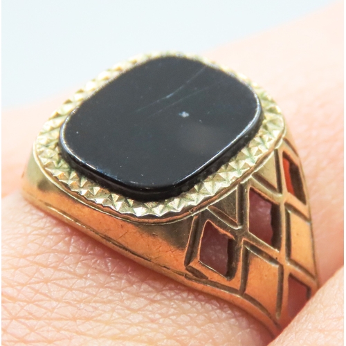 25 - Onyx Set Signet Ring Mounted in 9 Carat Yellow Gold Ring Size X