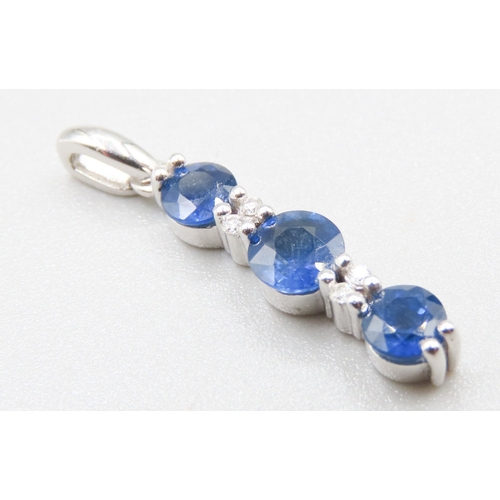 289 - Sapphire Three Stone Set Pendant with Further Diamond Inset Mounted in 9 Carat White Gold 2cm High