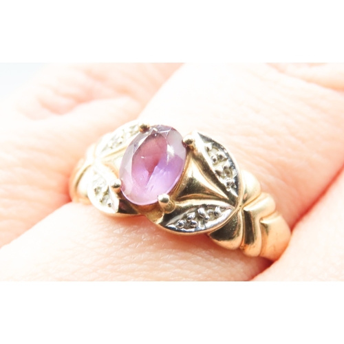 307 - Attractively Detailed Amethyst and Diamond Set Ladies Ring Mounted in 9 Carat Yellow Gold Ring Size ... 