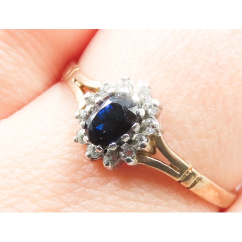 310 - Sapphire and Gemstone Set Ladies Cluster Ring Mounted in 9 Carat Yellow Gold Ring Size U