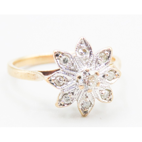 33 - Diamond Set Ladies Daisy Motif Ring Mounted in 9 Carat Yellow Gold Ring Size J and a Half