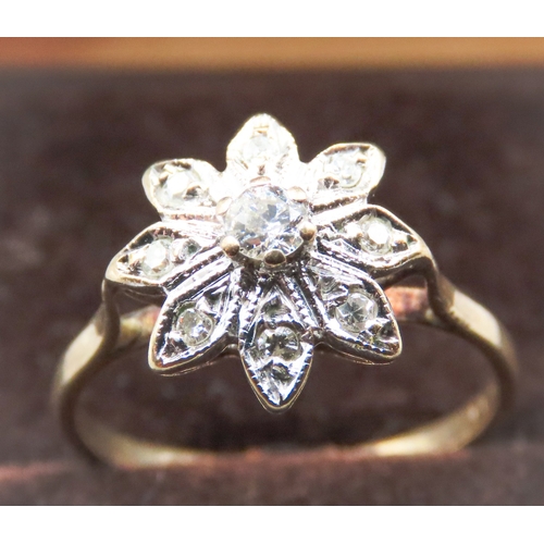 33 - Diamond Set Ladies Daisy Motif Ring Mounted in 9 Carat Yellow Gold Ring Size J and a Half