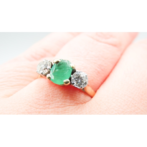 349 - Emerald and Diamond Set Three Stone Ring Four Claw Set Mounted in 18 Carat Yellow Gold Ring Size Q