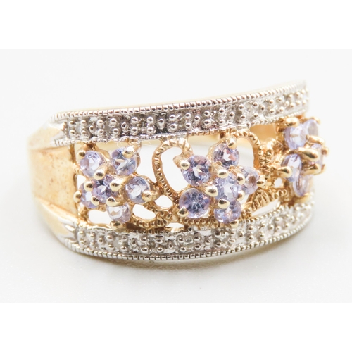 363 - Attractively Detailed Amethyst Daisy Cluster Ring with Further Diamond Insets Mounted in 9 Carat Yel... 