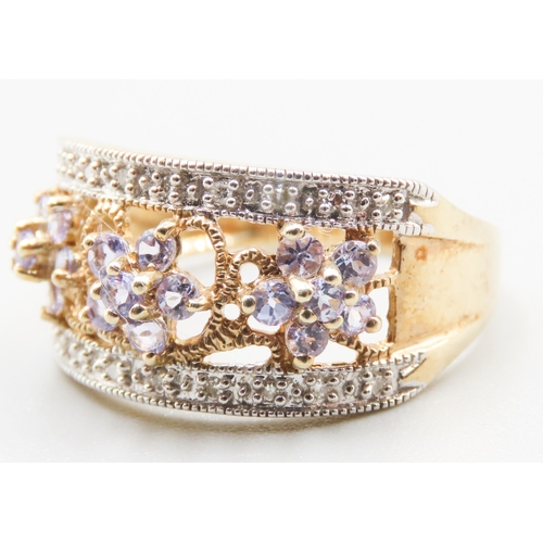 363 - Attractively Detailed Amethyst Daisy Cluster Ring with Further Diamond Insets Mounted in 9 Carat Yel... 