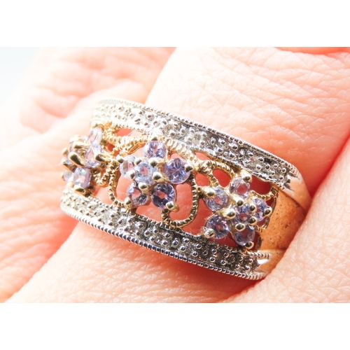 363 - Attractively Detailed Amethyst Daisy Cluster Ring with Further Diamond Insets Mounted in 9 Carat Yel... 