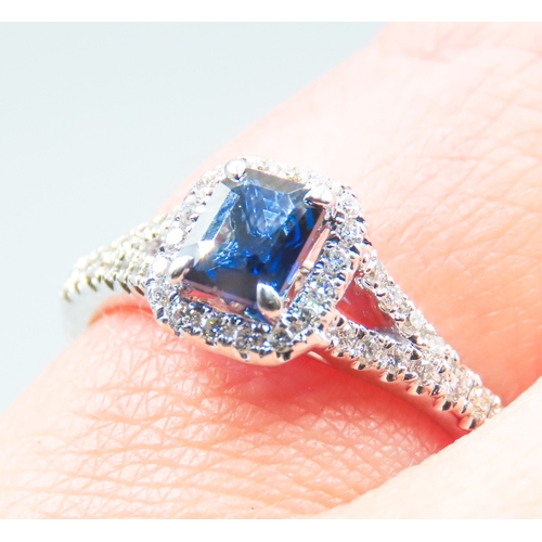 47 - Sapphire Centre Stone Ring with Diamond Set Halo Surround Mounted in 18 Carat White Gold Further Dia... 