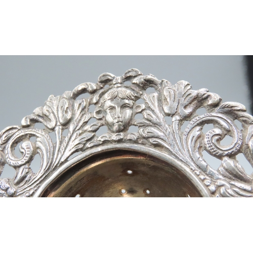 477 - Silver Tea Strainer Cherub Motif Decoration Attractively Detailed Hallmarked John Caffe London 1772