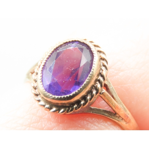 488 - Amethyst Bezel Set Single Stone Ring Mounted in 9 Carat Yellow Gold Ring Size K