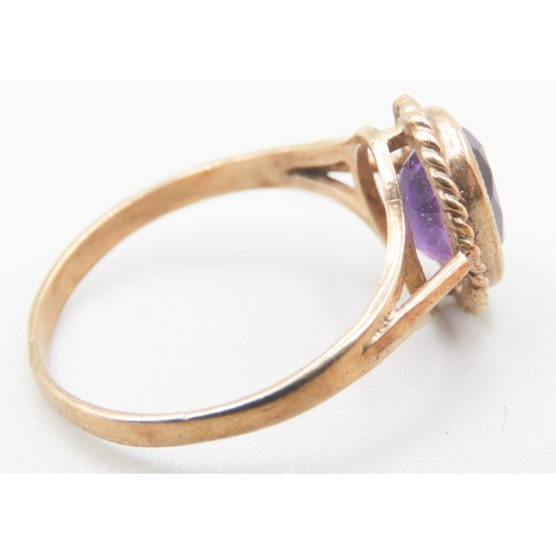 488 - Amethyst Bezel Set Single Stone Ring Mounted in 9 Carat Yellow Gold Ring Size K