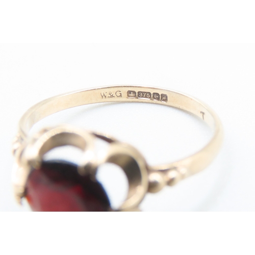 490 - Red Garnet Set Single Stone Ring Mounted in 9 Carat Yellow Gold Ring Size P and a Half