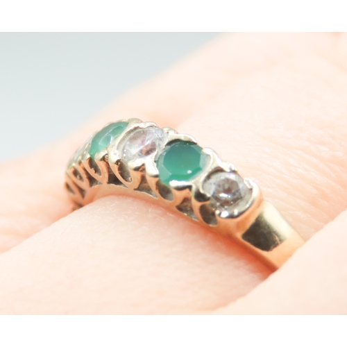 495 - Emerald and Gemstone Set Seven Stone Ring Mounted in 9 Carat Yellow Gold Ring Size O and a Half