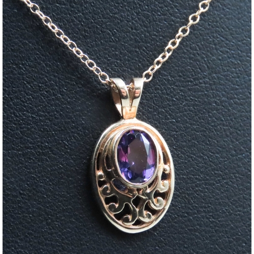 497 - Attractively Detailed Amethyst Set Pendant Mounted in 9 Carat Yellow Gold 1.5cm High Set on 9 Carat ... 