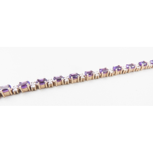 502 - Amethyst Twenty Six Stone Set Bracelet with Further Diamond Insets Mounted in 9 Carat Yellow Gold 19... 