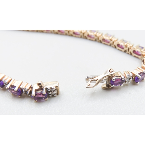 502 - Amethyst Twenty Six Stone Set Bracelet with Further Diamond Insets Mounted in 9 Carat Yellow Gold 19... 