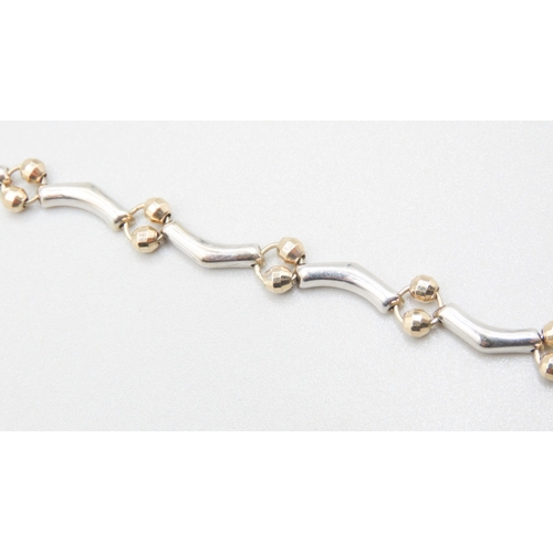 519 - 9 Carat White and Yellow Gold Fancy Link Bracelet with Facet Cut Yellow Gold Spacer Beads 19cm Long