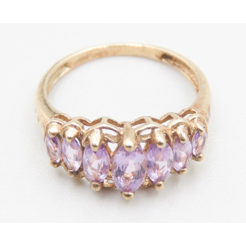 535 - Marquise Cut Amethyst Seven Stone Graduated Form Ring Mounted in 9 Carat Yellow Gold Ring Size M