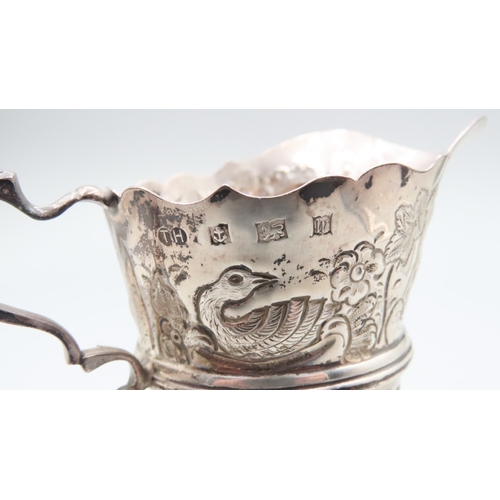 545 - Irish Form Silver Bachelors Jug Swan and Fox Motifs Flying C Scrolling Question  8cm High