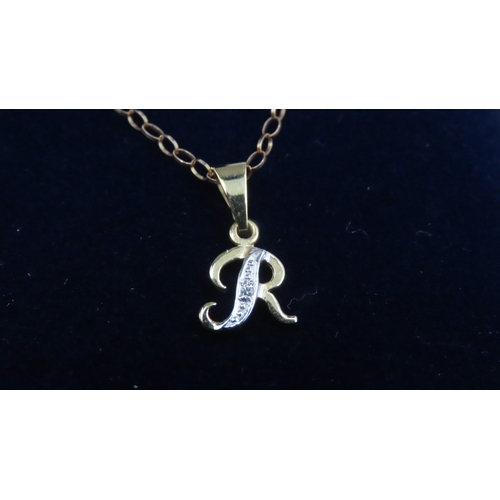 562 - Diamond Set 9 Carat Yellow Gold Letter R Pendant 1cm High Further Set on 9 Carat Yellow Gold chain 4... 