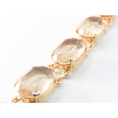 57 - Citrine Nine Stone Set Bracelet Mounted in 9 Carat Yellow Gold 17.5cm Long