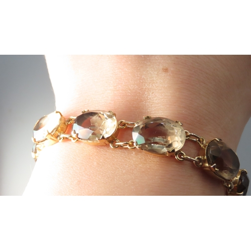 57 - Citrine Nine Stone Set Bracelet Mounted in 9 Carat Yellow Gold 17.5cm Long