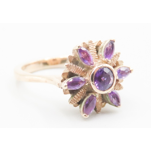 579 - Amethyst Set Floral Motif Ring Attractively Detailed Set in 9 Carat Yellow Gold Ring Size I and a Ha... 