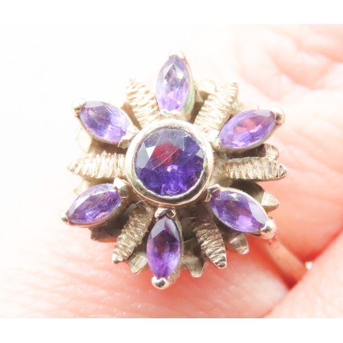 579 - Amethyst Set Floral Motif Ring Attractively Detailed Set in 9 Carat Yellow Gold Ring Size I and a Ha... 