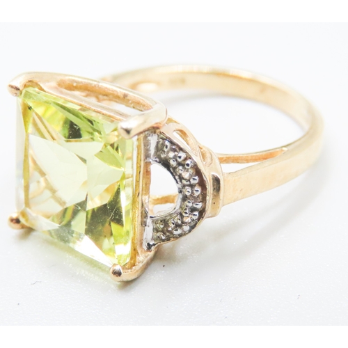 61 - Square Cut Beryl Set Ring Mounted in 9 Carat Yellow Attractively Detailed Diamond Inset to Shoulders... 