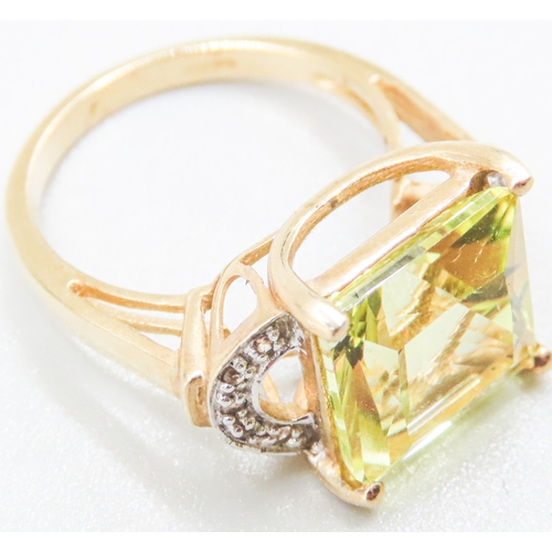 61 - Square Cut Beryl Set Ring Mounted in 9 Carat Yellow Attractively Detailed Diamond Inset to Shoulders... 