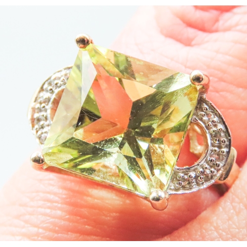 61 - Square Cut Beryl Set Ring Mounted in 9 Carat Yellow Attractively Detailed Diamond Inset to Shoulders... 