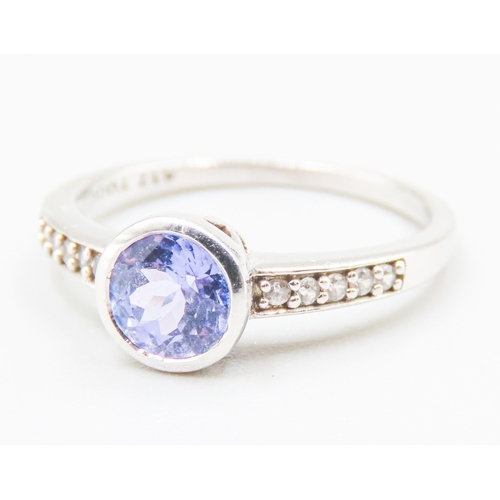 63 - Bezel Set Tanzanite Mounted in 10 Carat White Gold Further Diamond Insets to Shoulders Ring Size N a... 