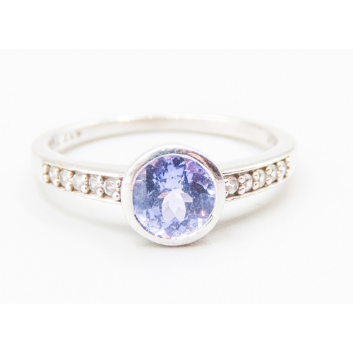 63 - Bezel Set Tanzanite Mounted in 10 Carat White Gold Further Diamond Insets to Shoulders Ring Size N a... 