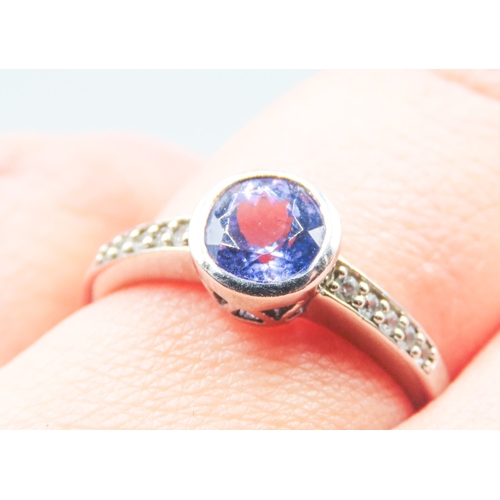 63 - Bezel Set Tanzanite Mounted in 10 Carat White Gold Further Diamond Insets to Shoulders Ring Size N a... 