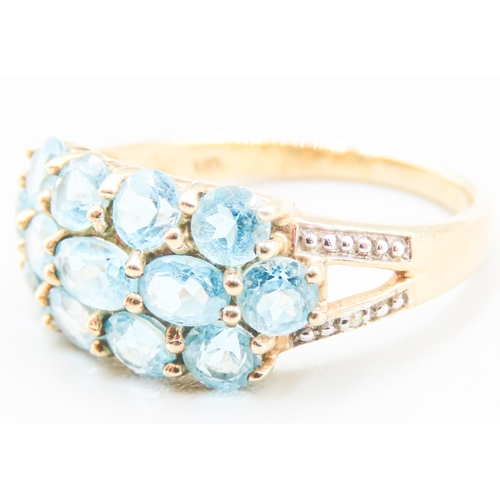 68 - Blue Topaz Set Ladies Cluster Ring Mounted in 9 Carat Yellow Gold Ring Size P and a Half