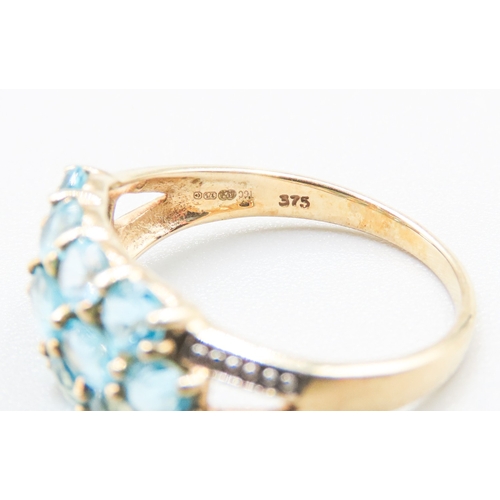 68 - Blue Topaz Set Ladies Cluster Ring Mounted in 9 Carat Yellow Gold Ring Size P and a Half