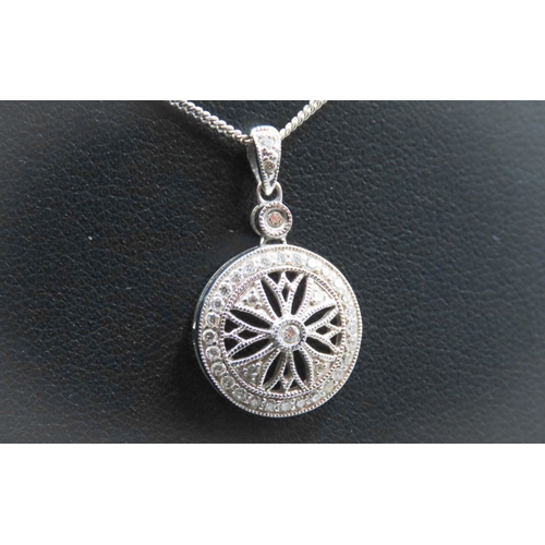 73 - Attractively Detailed Diamond Set Circular Form Pendant Mounted in 9 Carat White Gold 2cm Drop Set o... 