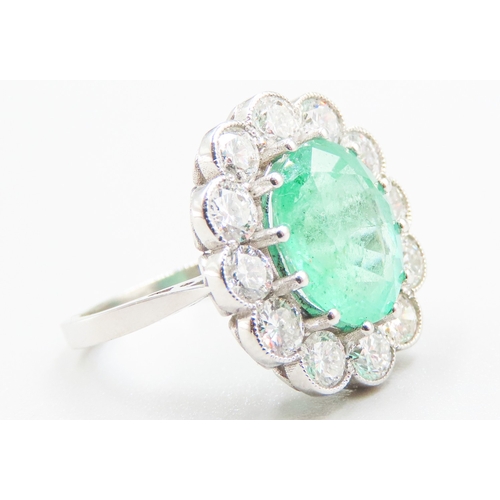 76 - Emerald Centre Stone Ring with Twelve Diamond Set Halo Surround Mounted in Platinum Emerald Carat We... 