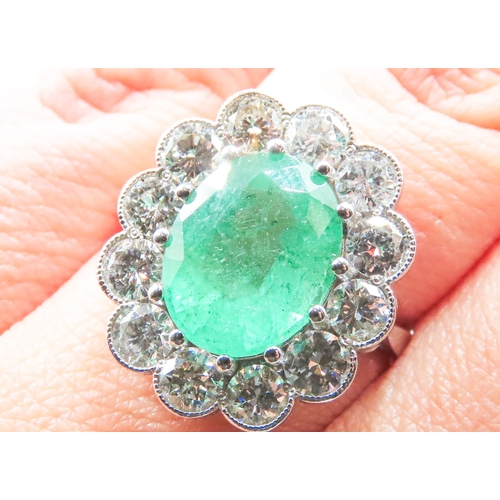 76 - Emerald Centre Stone Ring with Twelve Diamond Set Halo Surround Mounted in Platinum Emerald Carat We... 